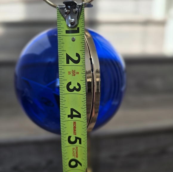 Cobalt blue wristlet round ball, gold trim and gold crossbody chain. - Picture 8 of 9